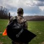H.S. Strut Turkey Decoy Bag with nylon carrying strap and deployable safety orange flag.
